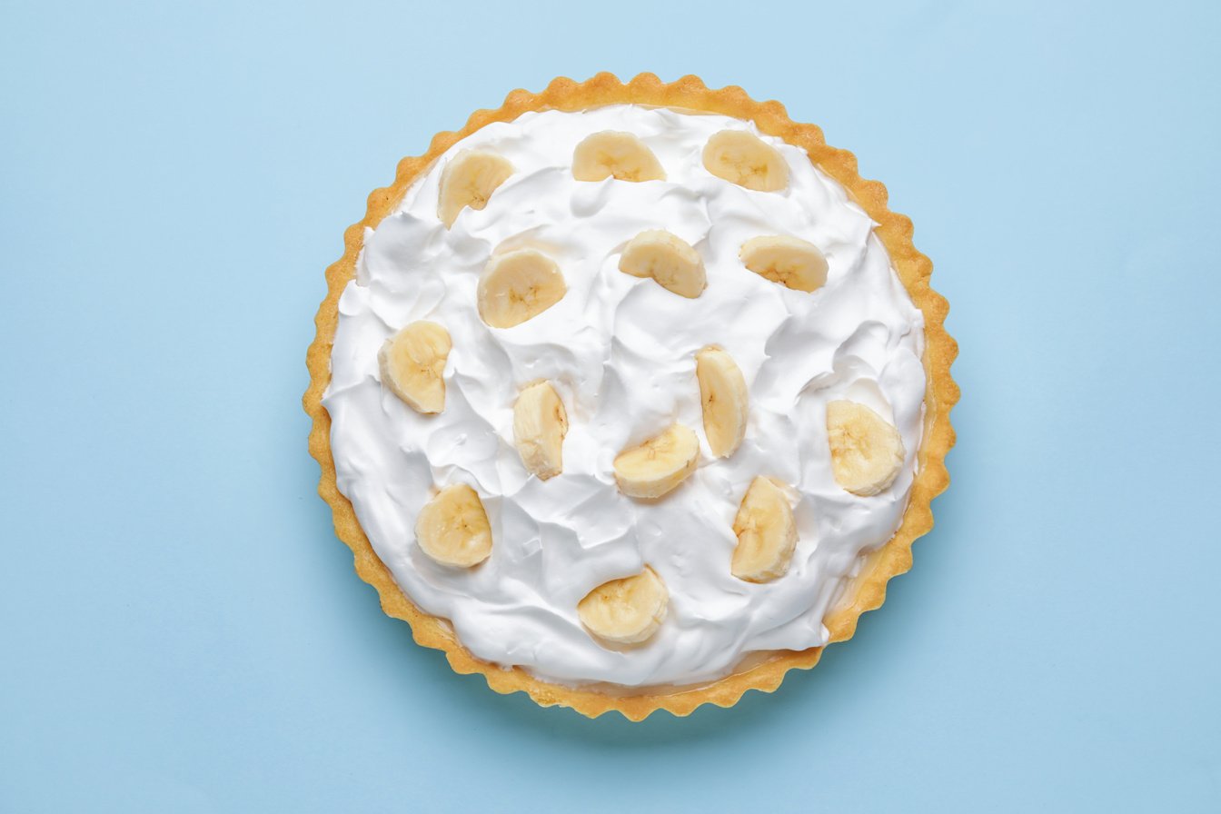 Tasty Banana Pie on Color Background